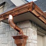 copper gutter system with copper miter copper downspout and copper leader head